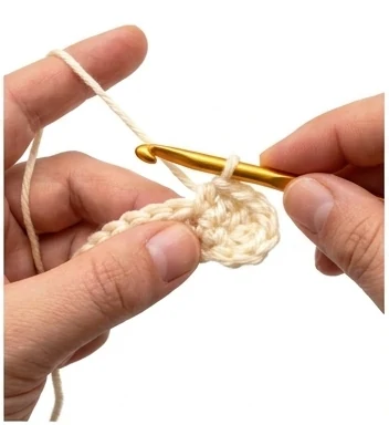 US double crochet step 3: Pull through two loops