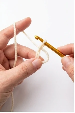 Slip knot step 1: Hold the yarn tail