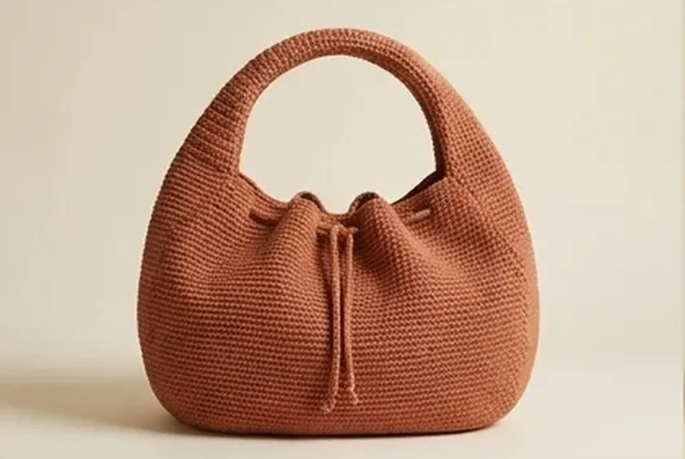Crochet crescent bag terracotta