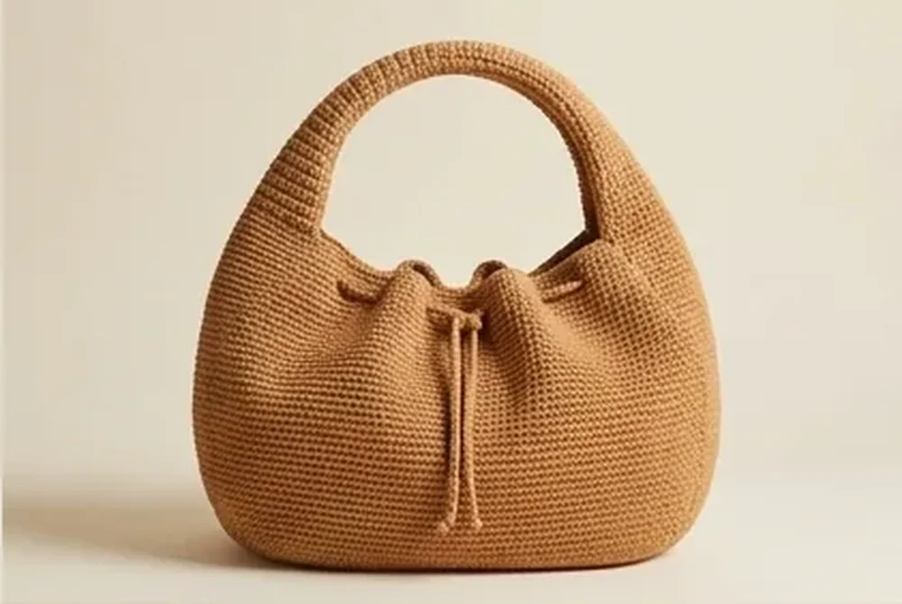 Crochet crescent bag warm caramel