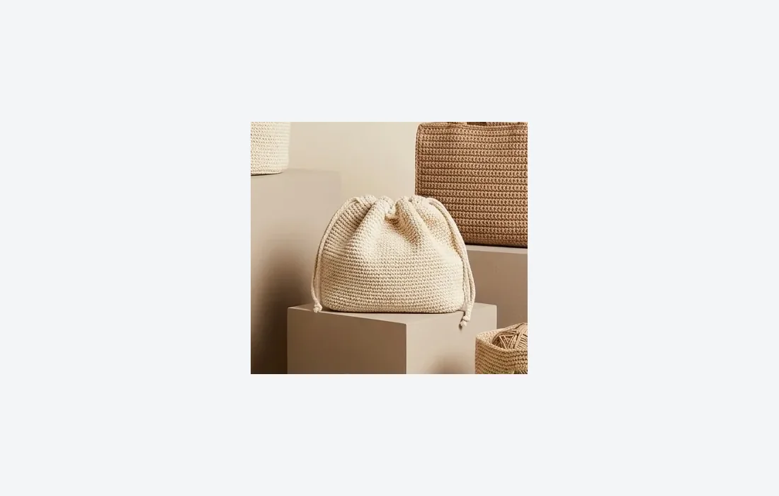 Crochet crescent bag flat shoulder