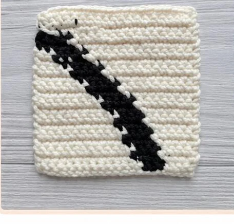 Wrong side of the finished practice swatch after hiding ends