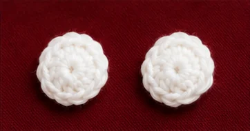 Two white crochet circles for the duck eyes