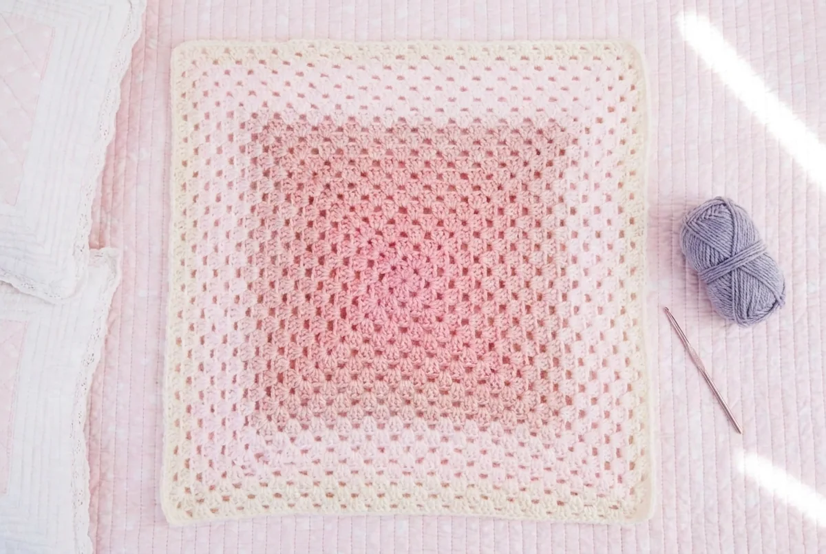 Hippo lovey crochet pattern step 4 pink granny square before gray edging
