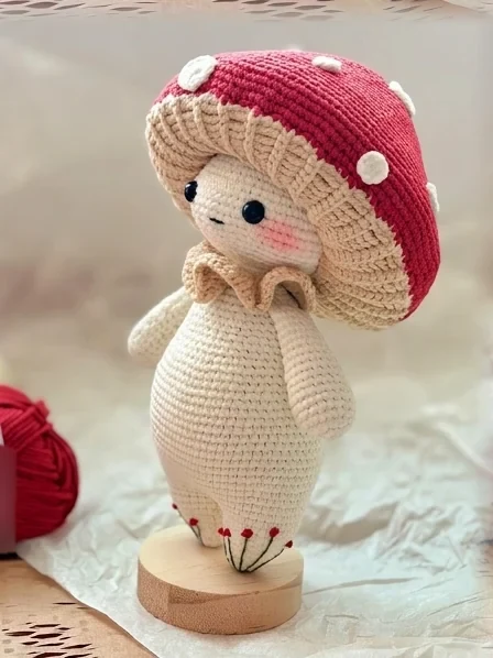 Left-facing reference showing the cap profile and lower-leg embroidery.