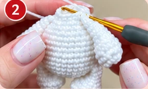 Joining the snowman arms into the upper body, photograph 2