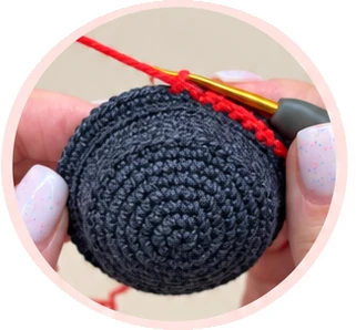 Working the red single crochet hat band
