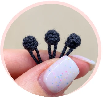 Dark gray crochet button construction, process photograph 5