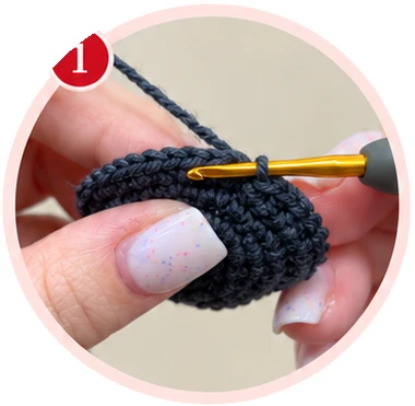 Dark gray hat round showing the source inverted single crochet detail