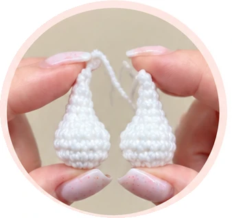 Pair of white crochet legs ready for joining